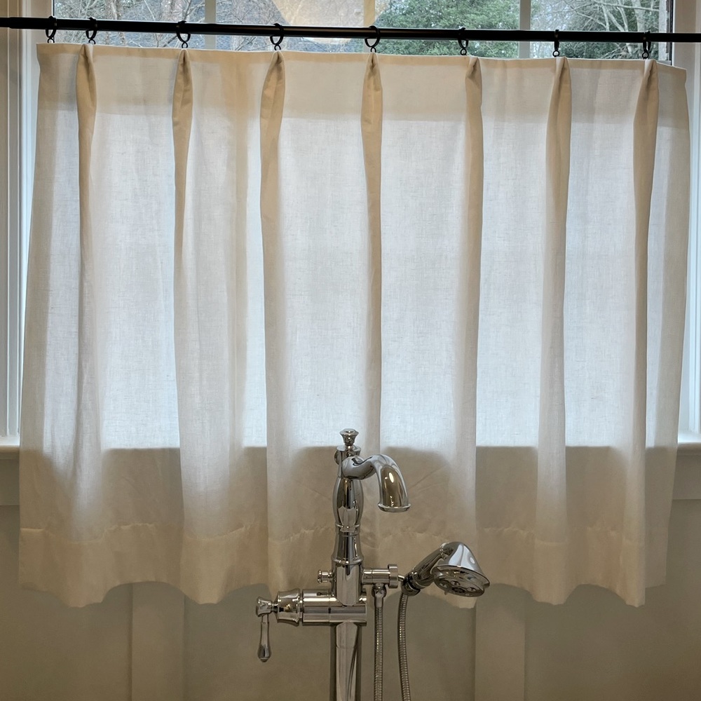 West Elm dark bronze metal curtain rings with thick linen blend cafe curtain.